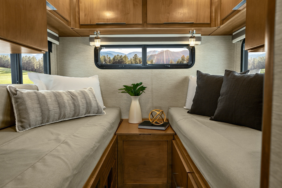 The interior of the Tiffin Wayfarer 24TW featuring two twin beds that combine to make a king-sized bed. 