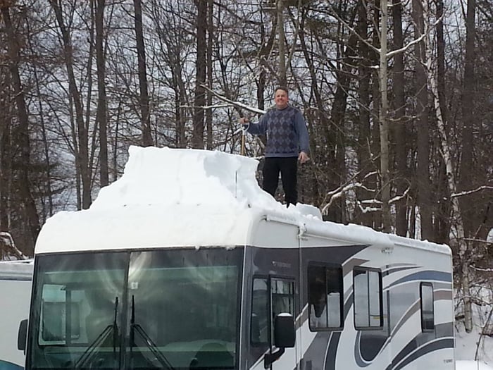 Shoveling snow off an RV