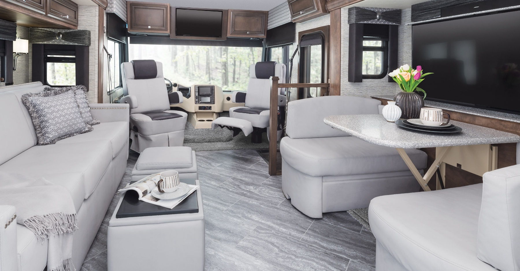 Six 2019 motorhomes, including Tiffin Open Road Allegro, Newmar Bay Star, Coachmen Leprechaun, Winnebago Fuse, Pleasure-Way Lexor TS, Midwest Automotive Designs Weekender