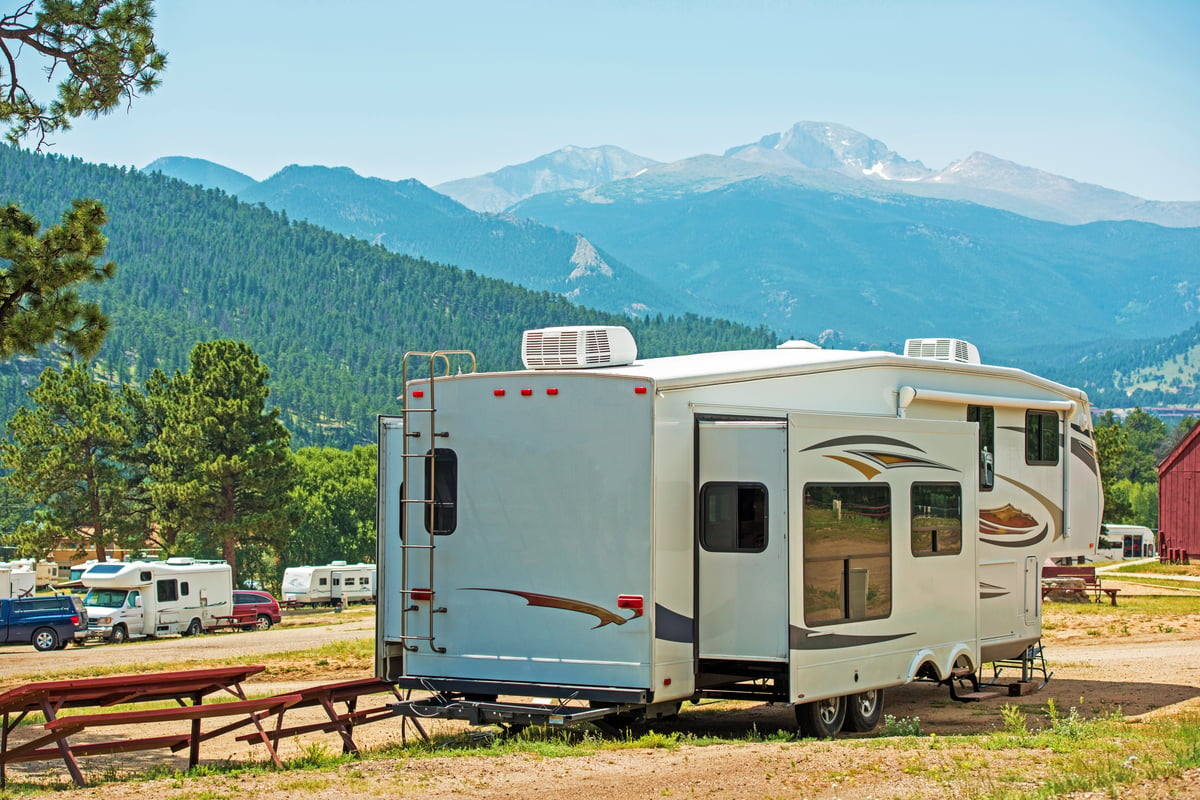 5th Wheel parked with mountain view