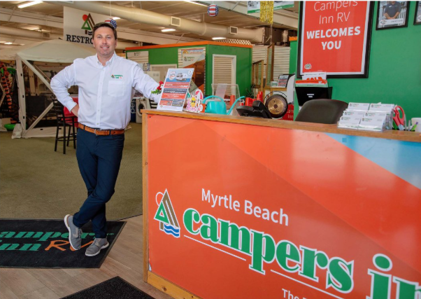 Daniel stands inside Campers Inn of Myrtle Beach