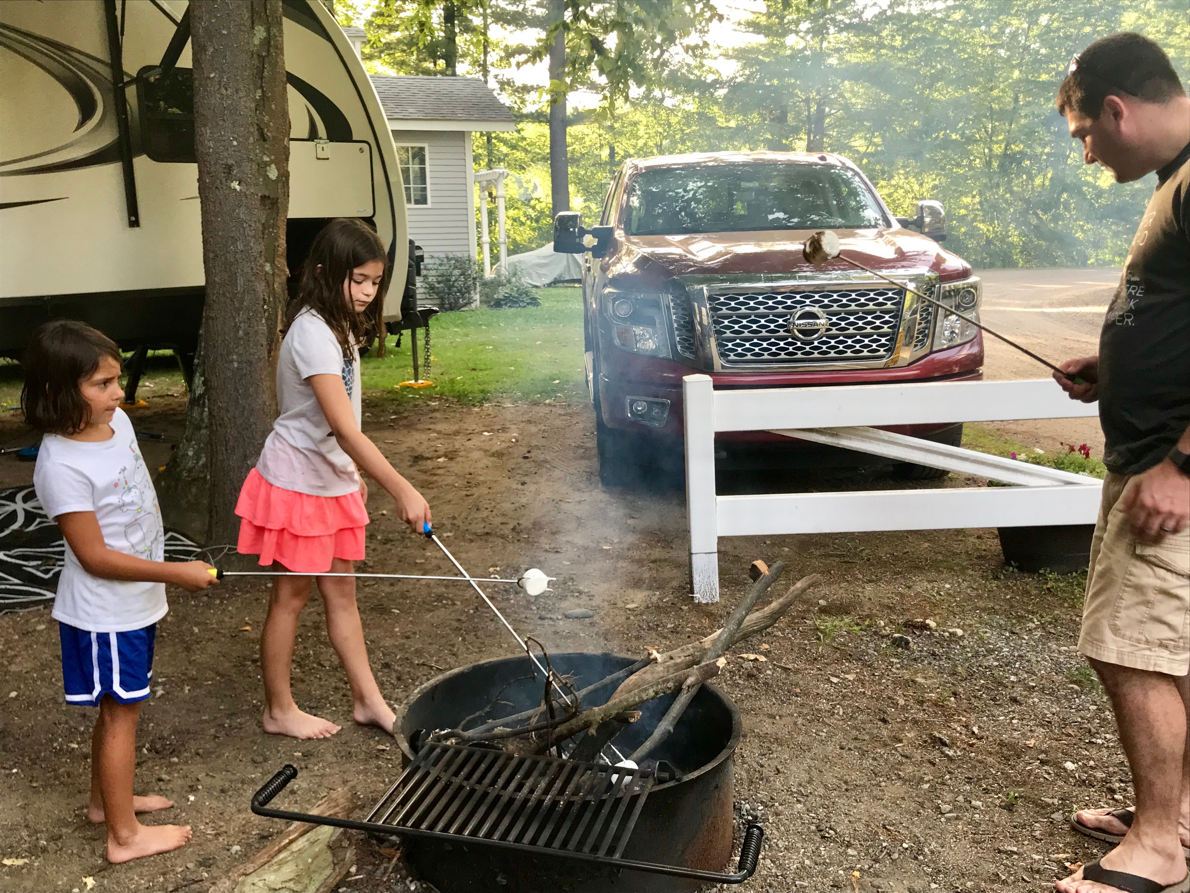 Campers Inn RV COO Ben Hirsch roasts marshmallows with his daughters