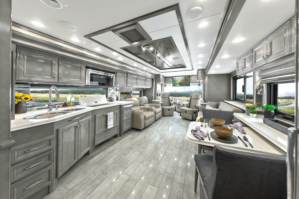 The interior of the 2020 Tiffin Phaeton featuring sterling cabinets and coastal sand décor.