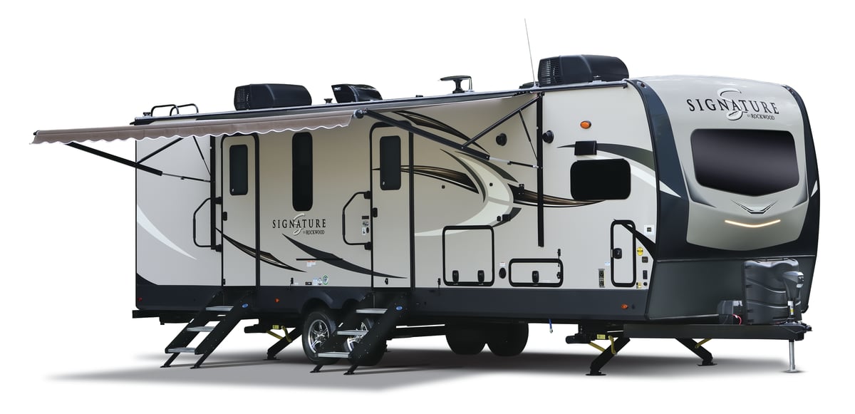 The exterior of the 2020 Rockwood Signature Ultra Lite travel trailer featuring double entry doors and a retractable awning. 