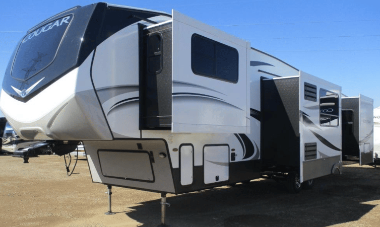 The exterior of the 2020 Keystone RV Cougar fifth wheel 367FLS features 4 slides and a 20-foot-long awning. 