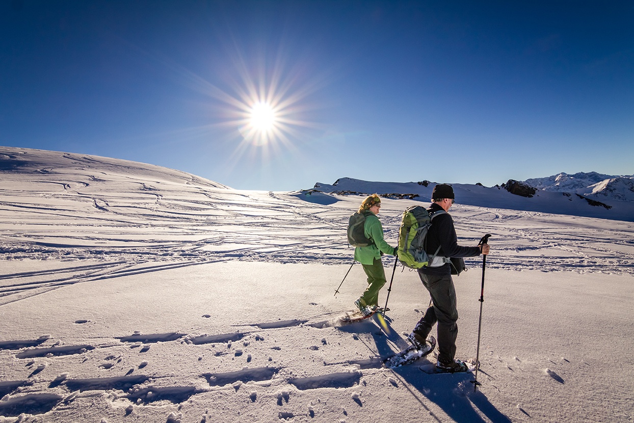 Camping at a four-season RV campground brings you closer to outdoor activities like snowshoeing