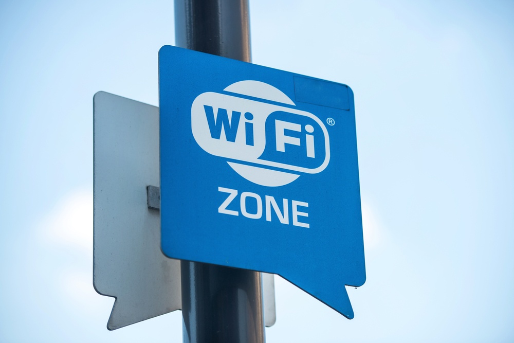 Wireless internet sign on pole on the street.jpeg