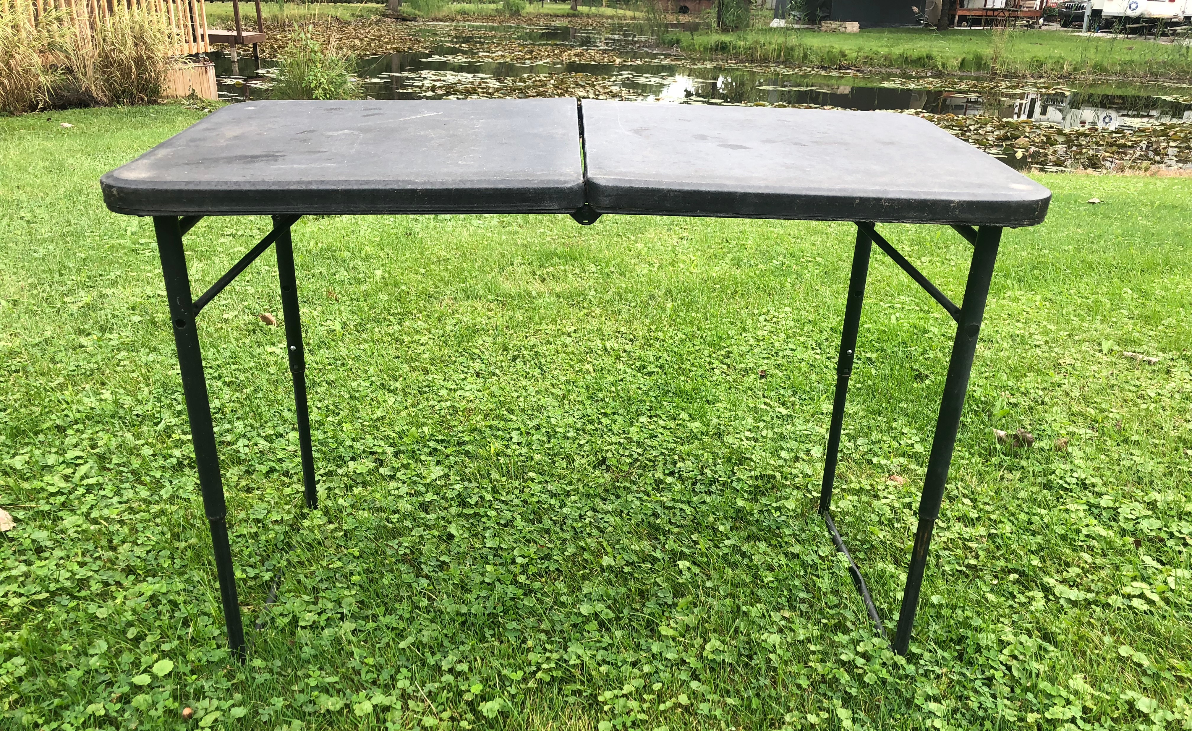 Use folding tables for cooking and eating outdoors at the campground