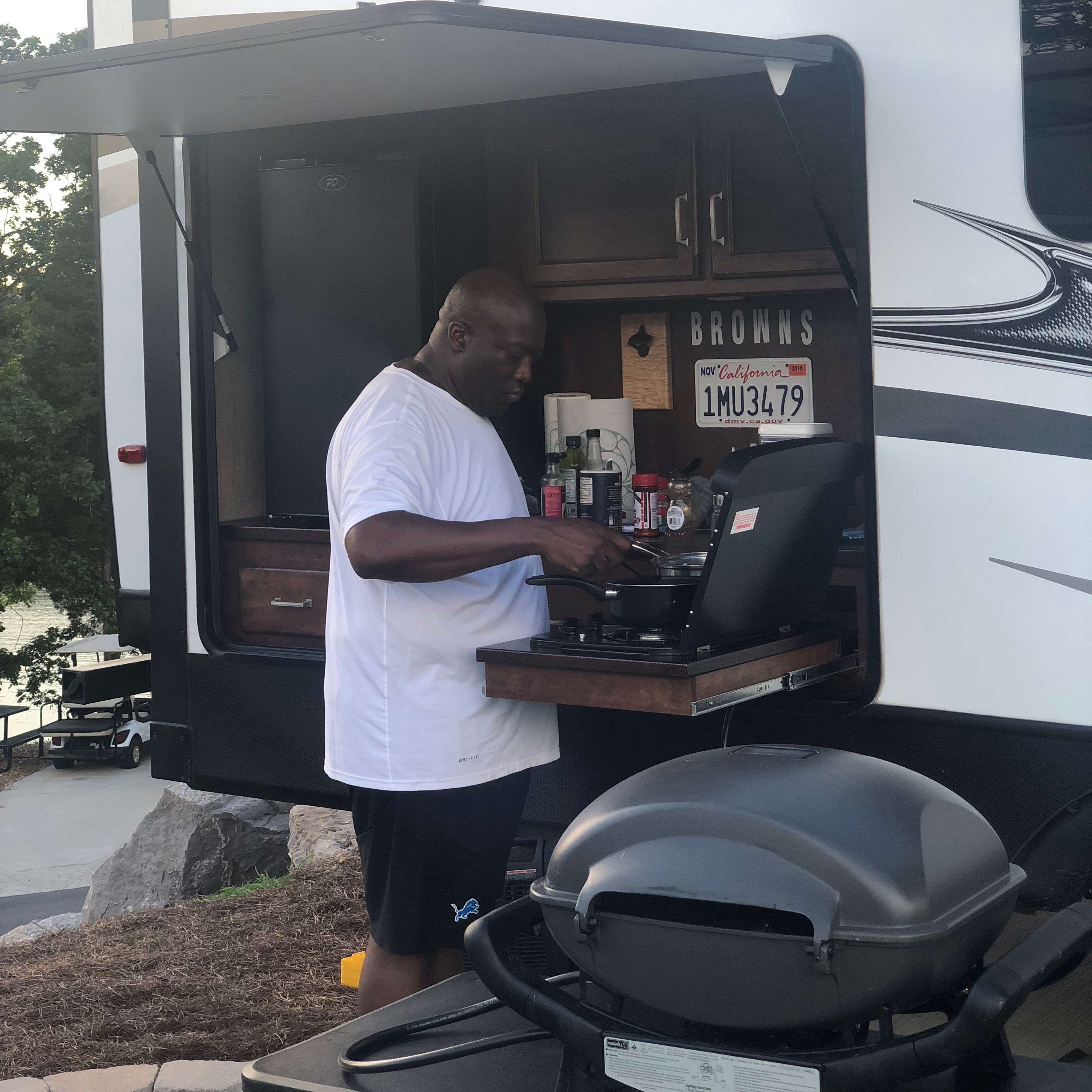 RVers love cooking in their outdoor kitchen when at the campground