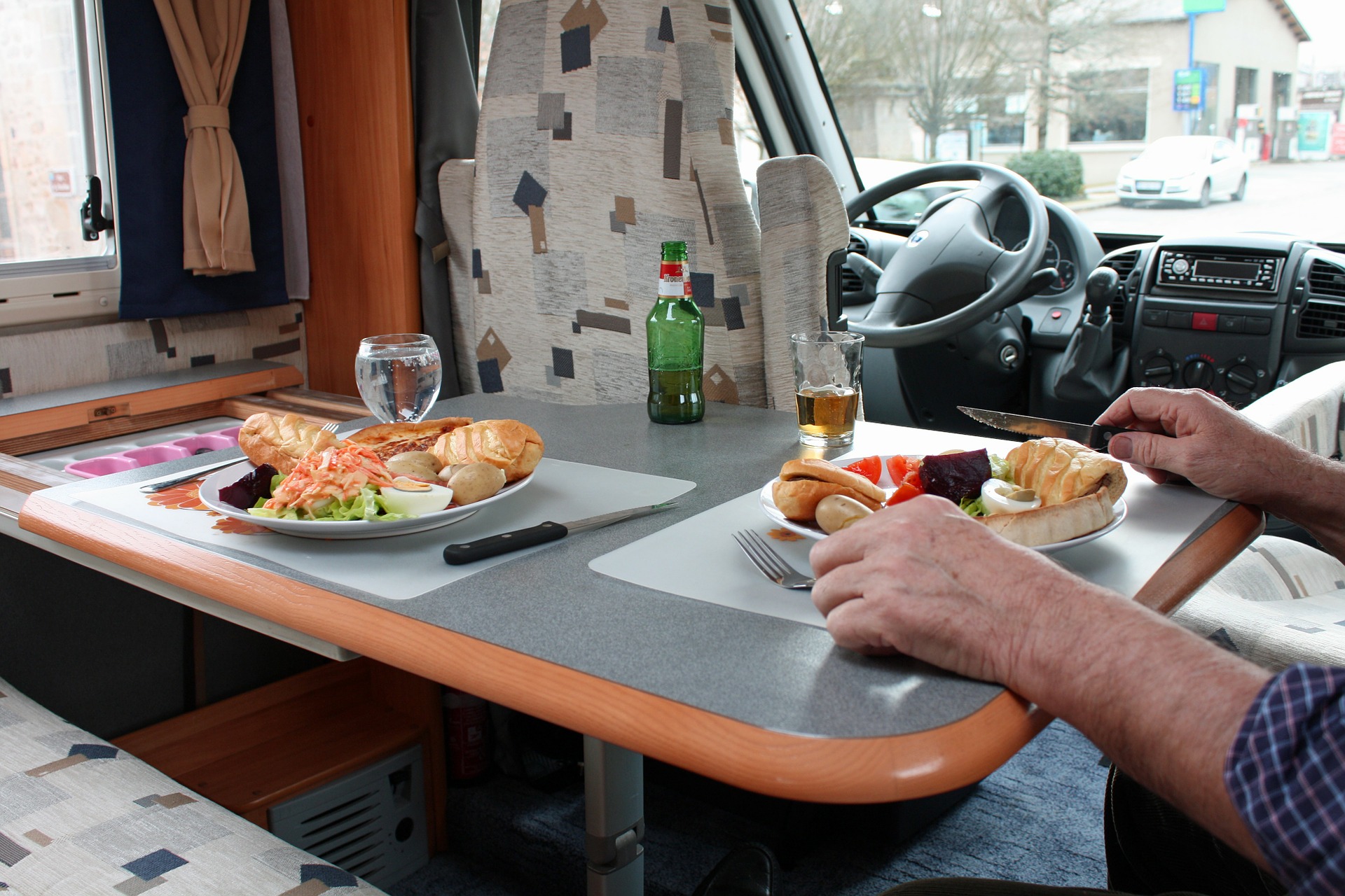 a meal set up in the interior of an rv