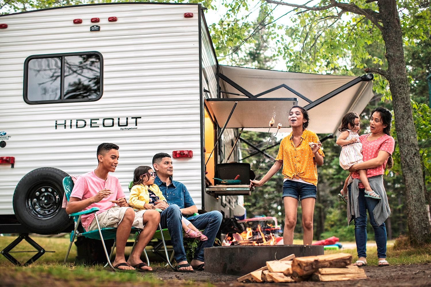 family having a cookout ourside of a keystone rv hideout