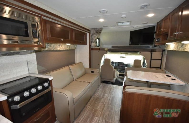 Living and eating space of the Forester Class C motorhome