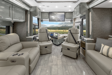 The interior of the Tiffin Phaeton 40IH, featuring upscale furnishing and neutral tones. 