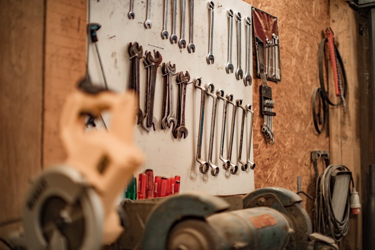 Tools hanging up on the wall of a maintenance auto shop