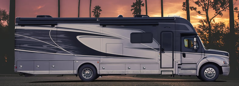 Super C Motorhome RV pictured with a sunset background