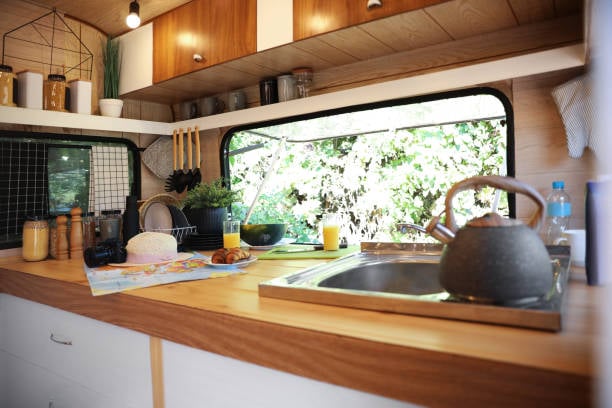 Homey image of a kitchen in an RV with breakfast set out