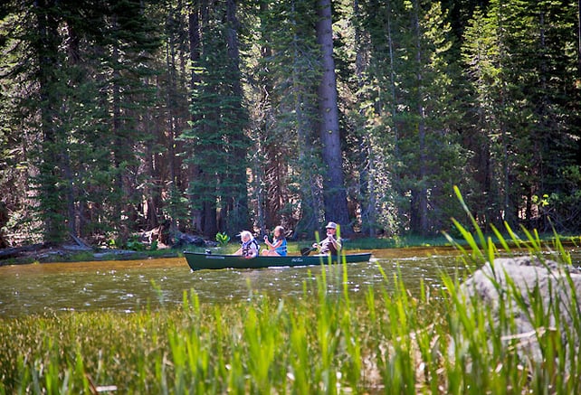 family kayaking at snowflower rv resort campground
