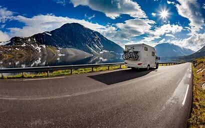 RV driving down the a picturesque road